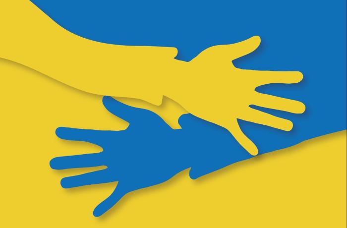 grijpen handen in Oekraïense kleuren