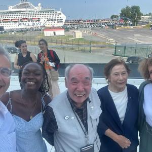 Samen met  Ito Masao en Kuramori Terumi en Joachim Coens, van de raad van bestuur van Pax Christi